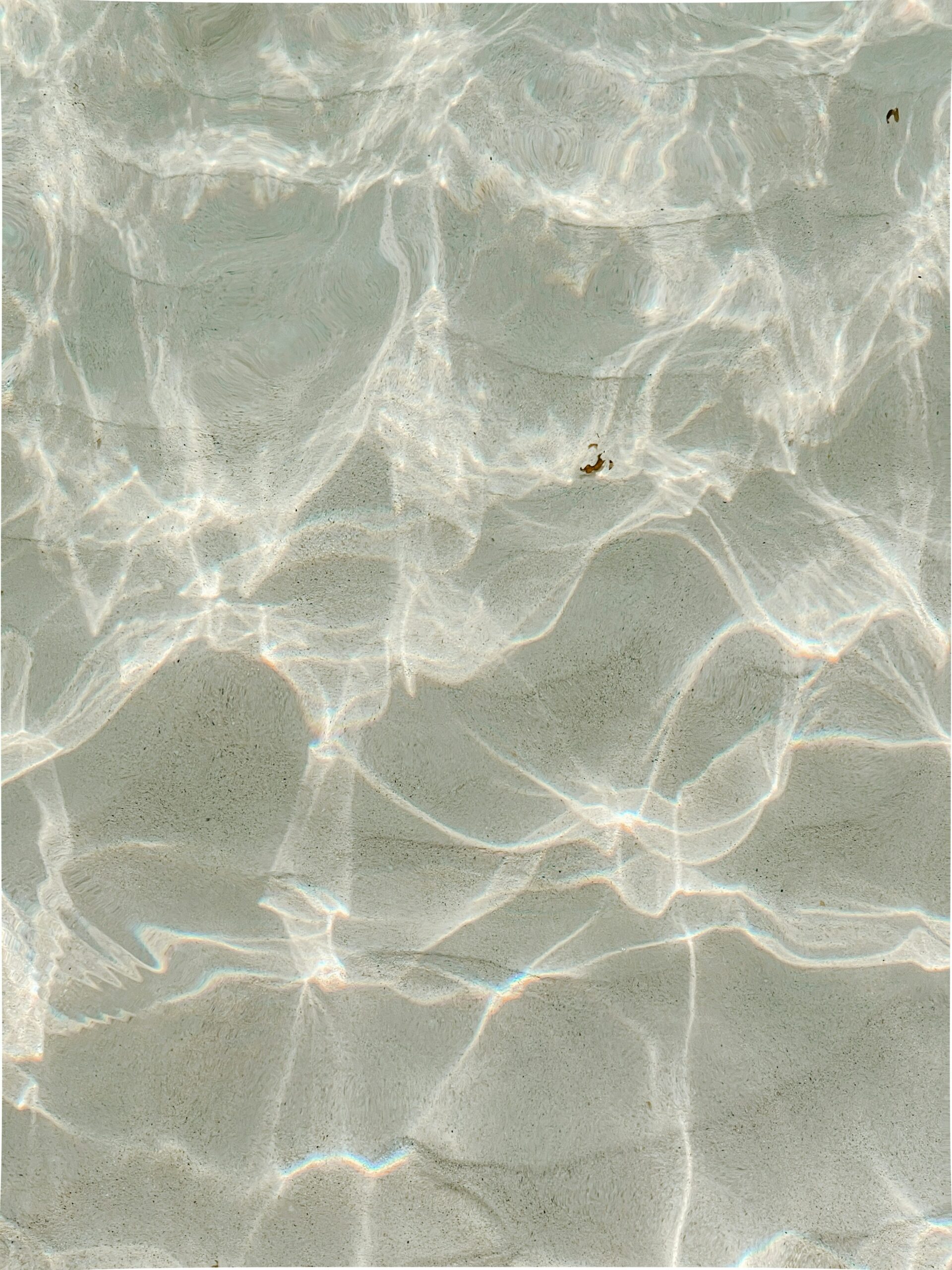 Image of clear water with light ripples
