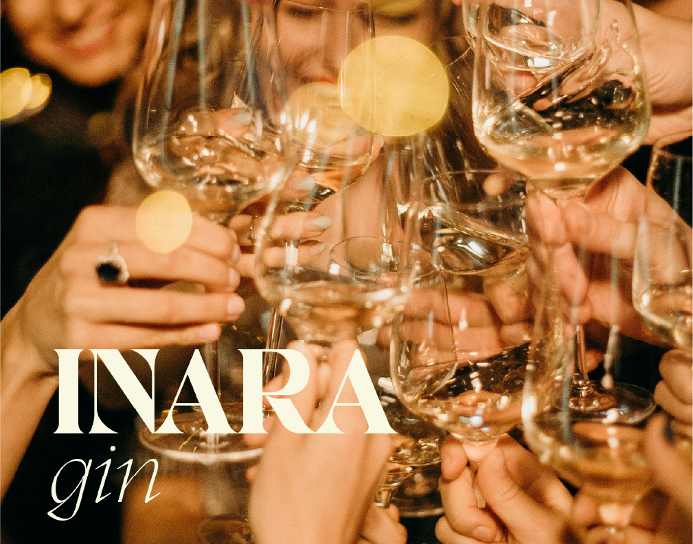 Image of people cheersing glasses with the Inara logo in white